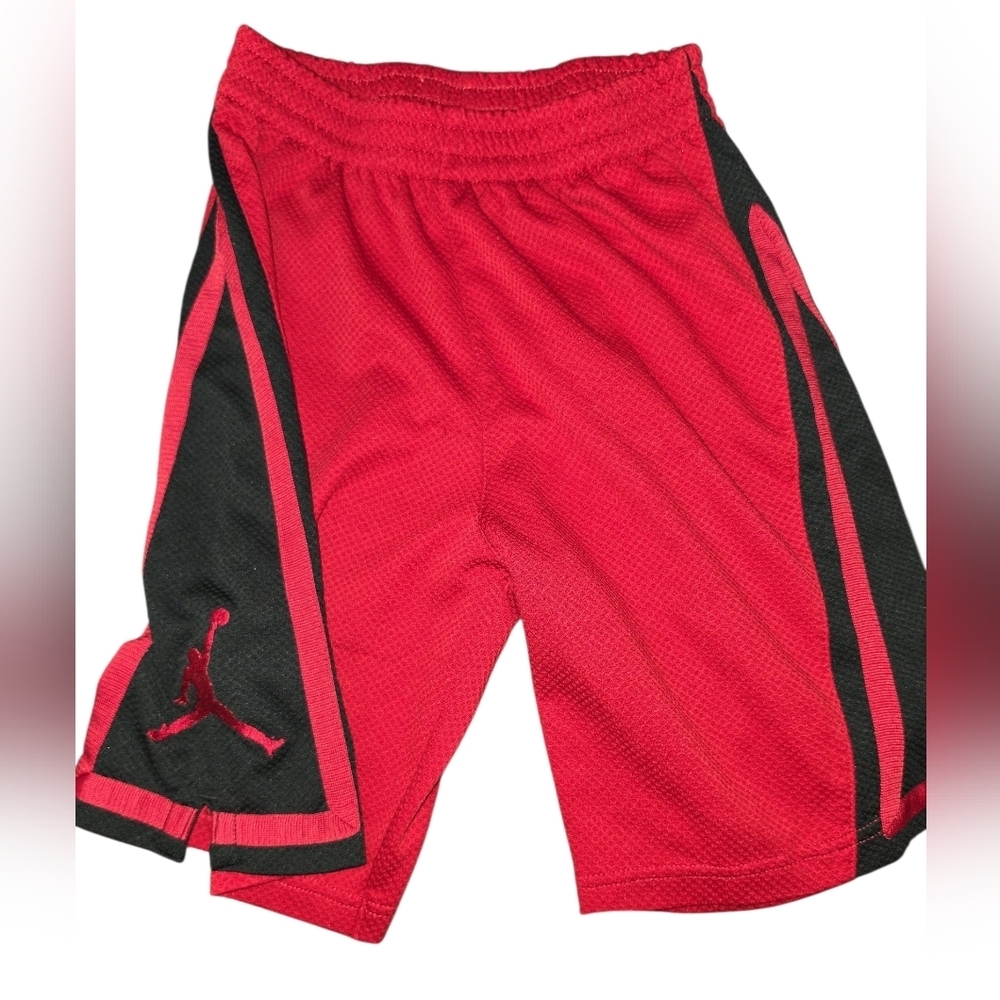 Jordan Red and Black Mesh Basketball Shorts In Preloved Condition. Size Kids Med